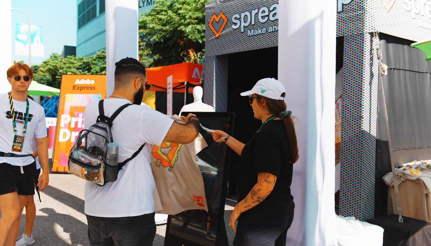 veecon attendees at spreadshop activation booth